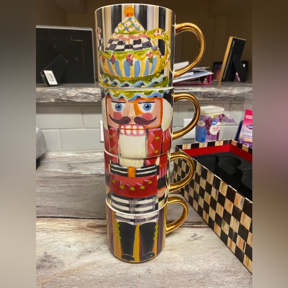 McKenzie and Childs Nutcracker 4 piece ceramic mug set.
